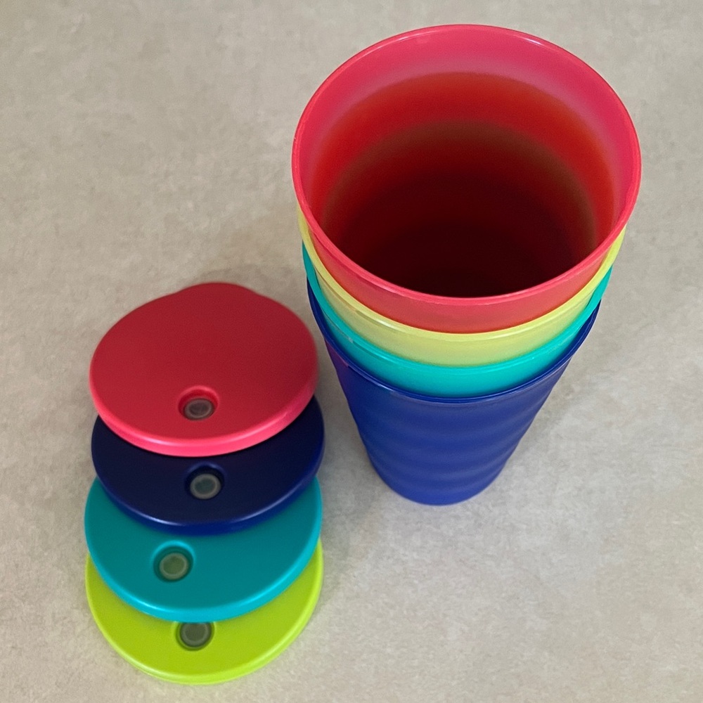 Tupperware Drink Cups with Lids containing Straw Holes
